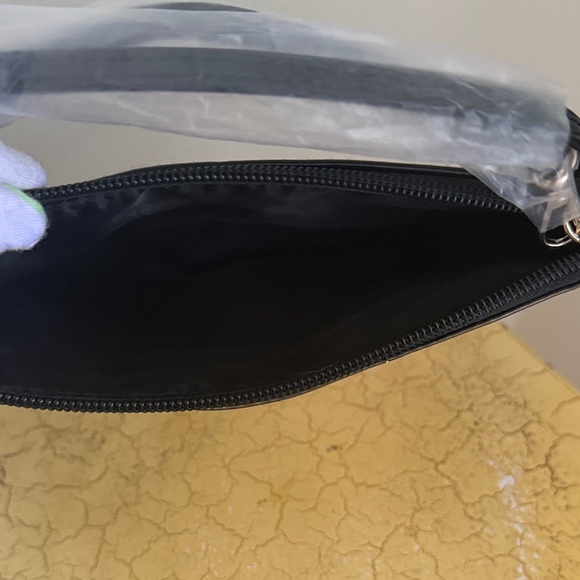 Victoria's Secret Black Clutch with Pink Sequins
NWOT - Picture 4 of 5